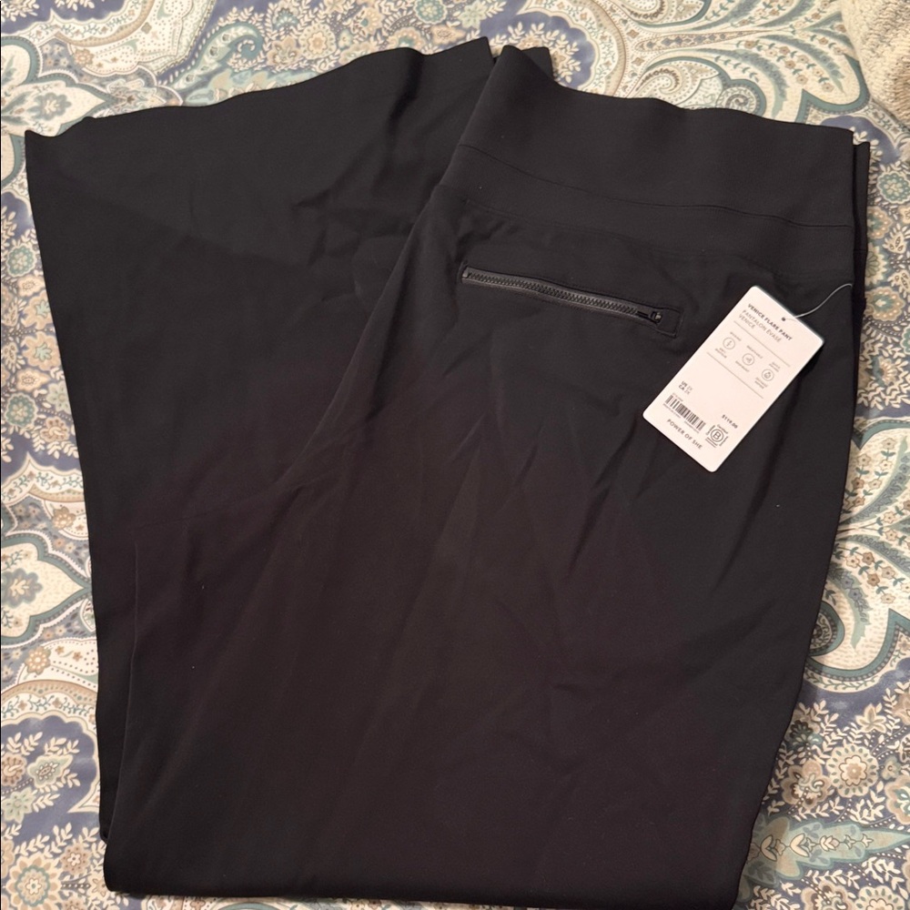 Women’s Black Venice flare pants by Athleta, size 2x.